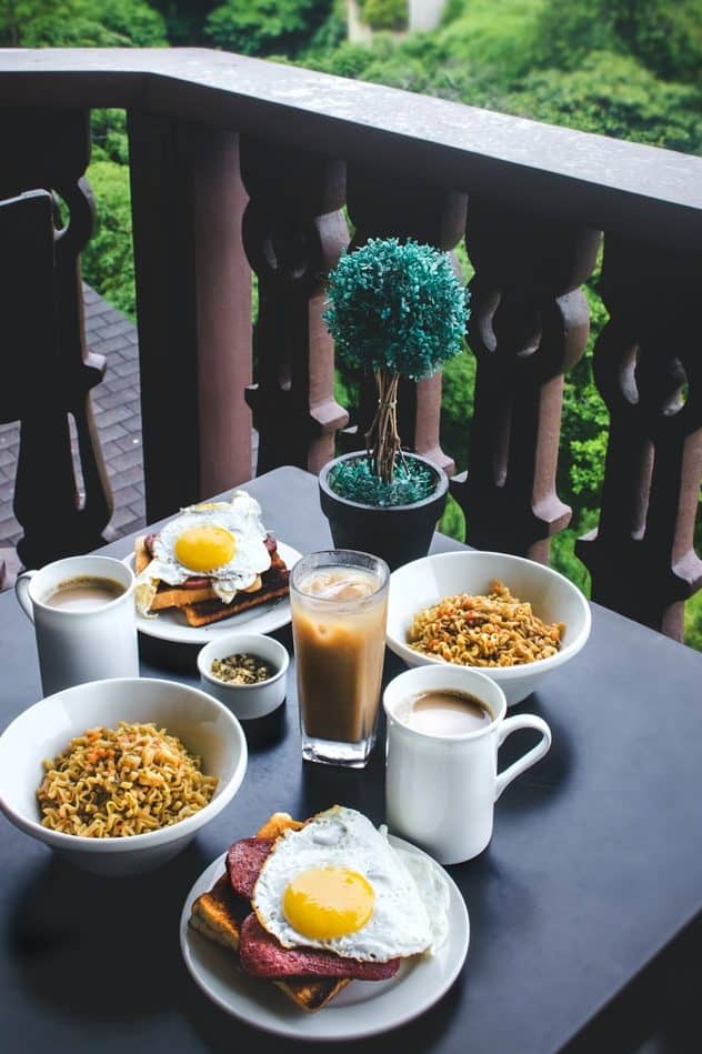 breakfast placed on table at terrace