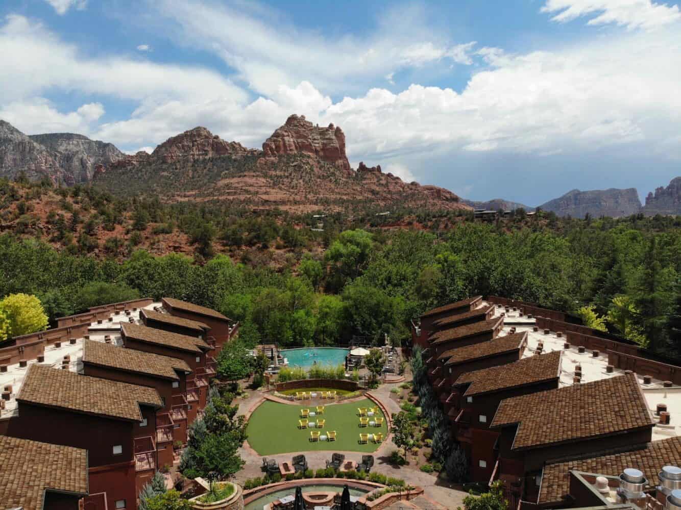 Amara Resort and Spa with views of resort with mountains in the background.