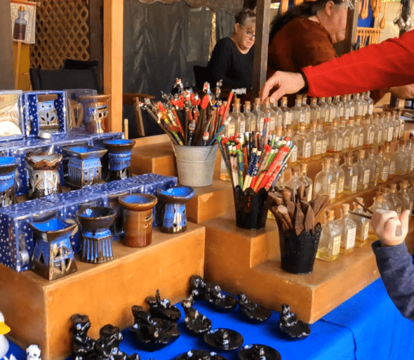 Merchant tent selling handmade gifts.