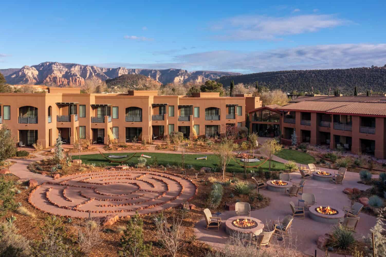 The Wilde Resort and Spa with views of resort with mountains in the background.