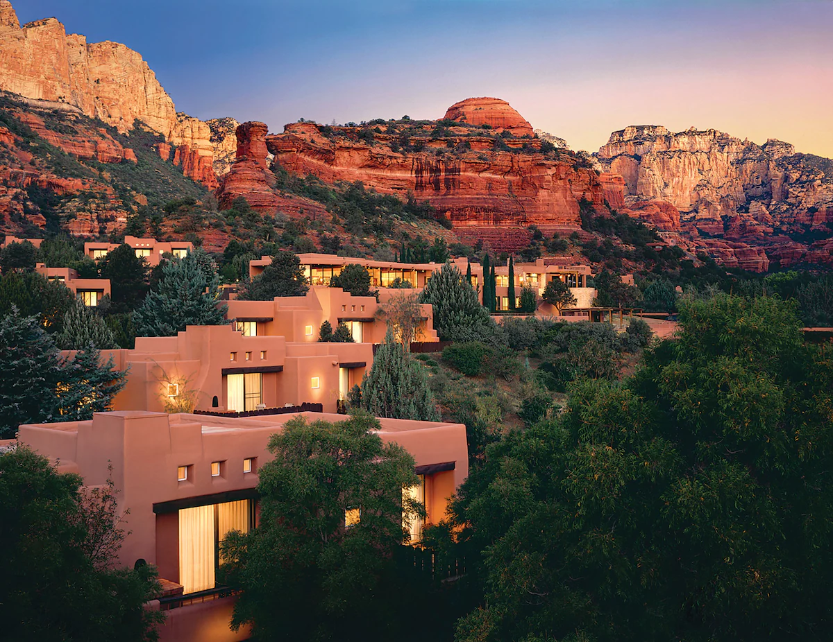 Enchantment Resort with views of resort with mountains in the background.